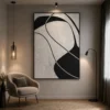 Modern black and cream abstract canvas wall art featuring flowing organic forms in a contemporary minimalist design.