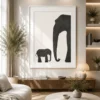 Minimalist mother and calf elephant canvas wall art featuring textured charcoal silhouettes on a neutral background for modern luxury interiors.