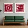 Luxury Warli tribal diptych wall art featuring traditional Tarpa dance, village life scenes, white folk illustrations on a crimson red background with natural wood frames.