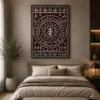 Luxury Lord Ganesha Warli canvas wall art featuring intricate white tribal illustrations, concentric Tarpa dance circles, peacocks, village life, and a terracotta background with a natural wood frame.