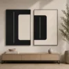 Modern black and cream abstract diptych canvas wall art featuring balanced geometric forms and minimalist contemporary design.