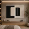 Modern black and cream abstract diptych canvas wall art featuring balanced geometric forms and minimalist contemporary design.