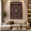 Luxury Lord Ganesha Warli canvas wall art featuring intricate white tribal illustrations, concentric Tarpa dance circles, peacocks, village life, and a terracotta background with a natural wood frame.