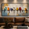 Colourful birds perched on a wire canvas wall art featuring textured palette-knife detailing for modern luxury interiors.