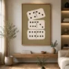 Modern abstract domino-inspired canvas wall art featuring cream geometric forms on a rich ochre background.