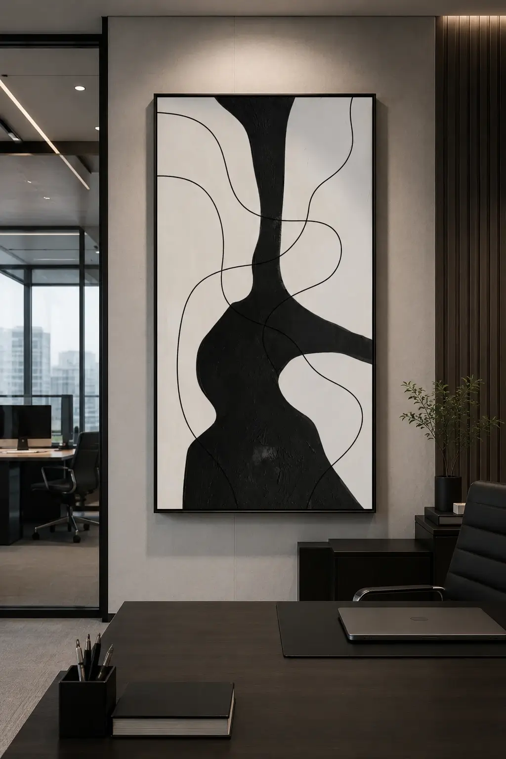 Modern black and cream abstract canvas wall art featuring a bold sculptural silhouette with flowing contour lines.