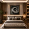 Luxury monochrome abstract canvas wall art featuring a hypnotic spiral vortex in charcoal, graphite, grey, and white with a contemporary minimalist design.