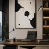 Modern black and cream organic abstract canvas wall art featuring flowing sculptural forms with minimalist contemporary styling.