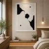 Modern black and cream organic abstract canvas wall art featuring flowing sculptural forms with minimalist contemporary styling.