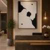 Modern black and cream organic abstract canvas wall art featuring flowing sculptural forms with minimalist contemporary styling.