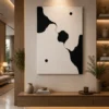 Modern black and cream organic abstract canvas wall art featuring flowing sculptural forms with minimalist contemporary styling.
