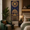 Luxury Warli Tree of Life canvas featuring radiant metallic gold tribal artwork on a deep indigo blue background with a natural wood gallery frame.