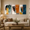 Luxury Cubist triptych canvas wall art featuring geometric abstract faces in terracotta, navy, sage green, and mustard tones with contemporary gallery styling.