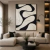 Black and cream Wabi-Sabi abstract canvas wall art featuring interwoven organic shapes with textured contemporary design.