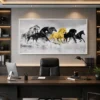 Luxury panoramic horse canvas wall art featuring galloping wild horses in monochrome with a striking golden horse at the centre.