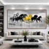 Luxury panoramic horse canvas wall art featuring galloping wild horses in monochrome with a striking golden horse at the centre.