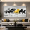 Luxury panoramic horse canvas wall art featuring galloping wild horses in monochrome with a striking golden horse at the centre.