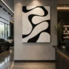 Black and cream Wabi-Sabi abstract canvas wall art featuring interwoven organic shapes with textured contemporary design.