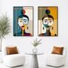 Luxury Cubist diptych canvas wall art featuring two abstract geometric portraits in teal, ochre, terracotta, cream, and charcoal tones.