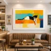 Luxury abstract cat canvas wall art featuring a relaxed calico cat with vibrant colour-block textures and contemporary artistic detailing.
