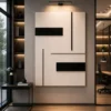 Modern black and cream geometric abstract canvas wall art featuring architectural blocks and textured minimalist design.