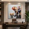 Luxury colourful elephant family canvas wall art featuring vibrant impasto textures and contemporary abstract wildlife design.