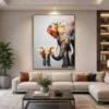Luxury colourful elephant family canvas wall art featuring vibrant impasto textures and contemporary abstract wildlife design.